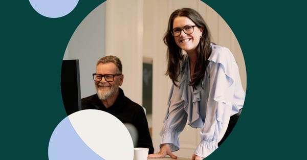 Photo of two people in office