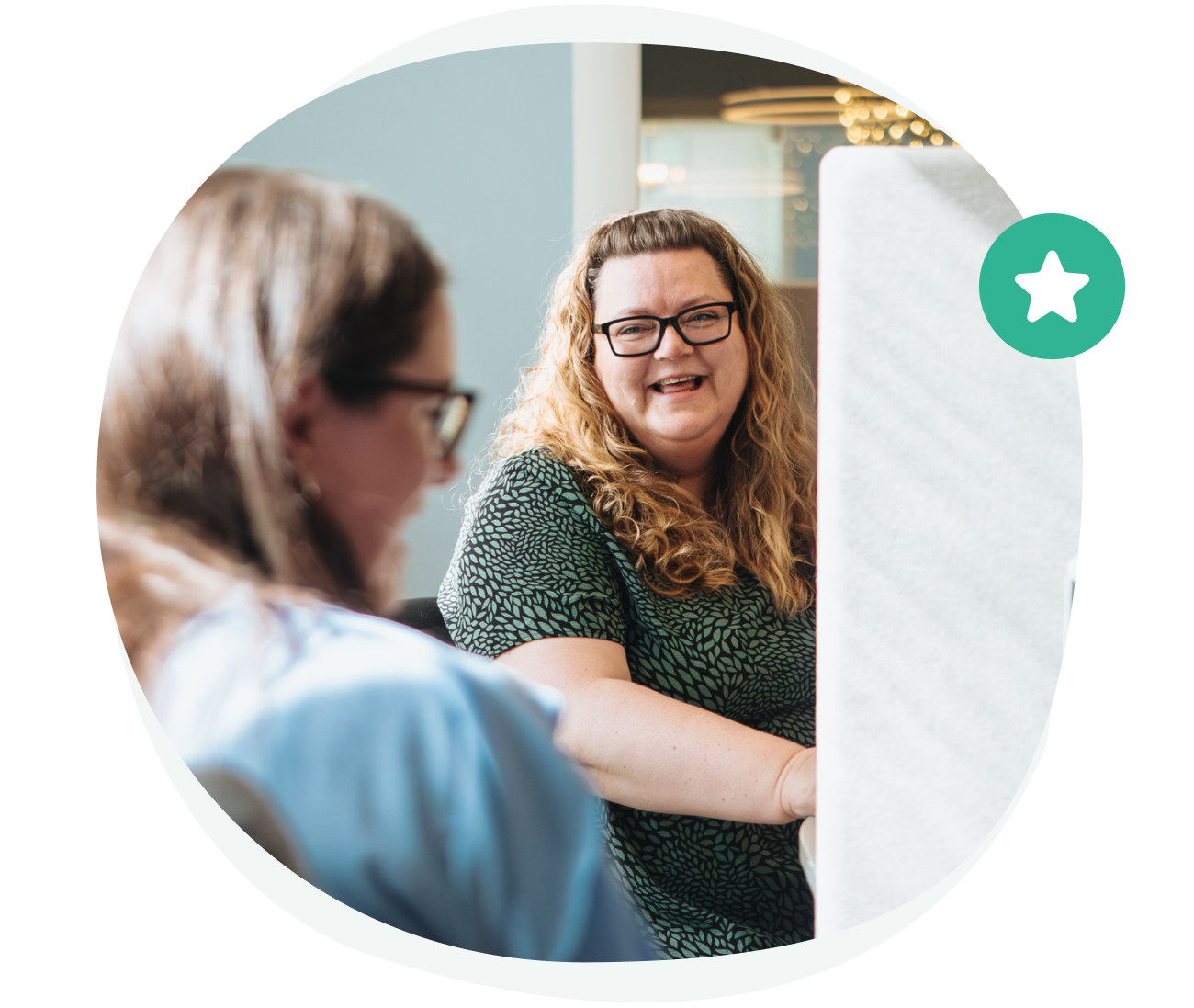 Three colleagues having a chat in the sofa