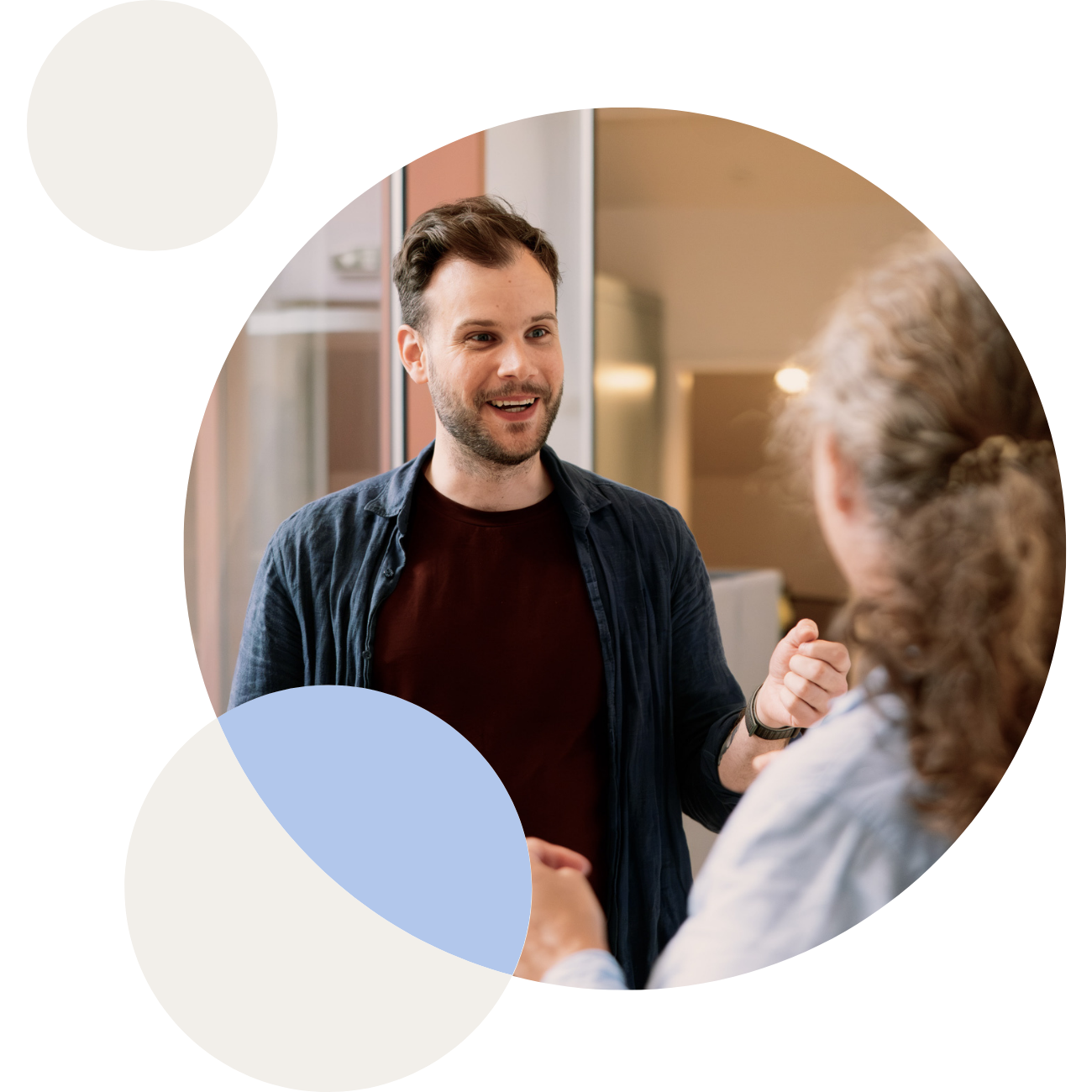 Several people working in a open office